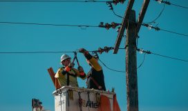 Electricians Fixing the Electric Lines